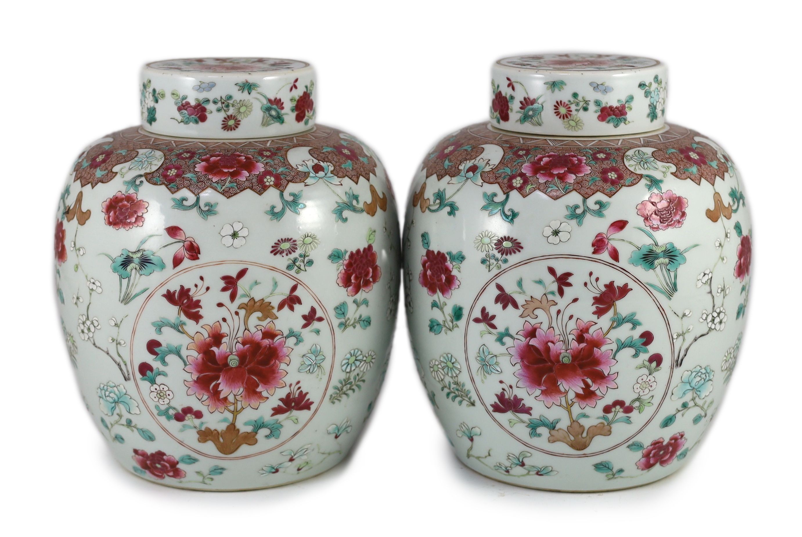 A good pair of Chinese famille rose ovoid jars and covers, 19th century, 28.5 cm high